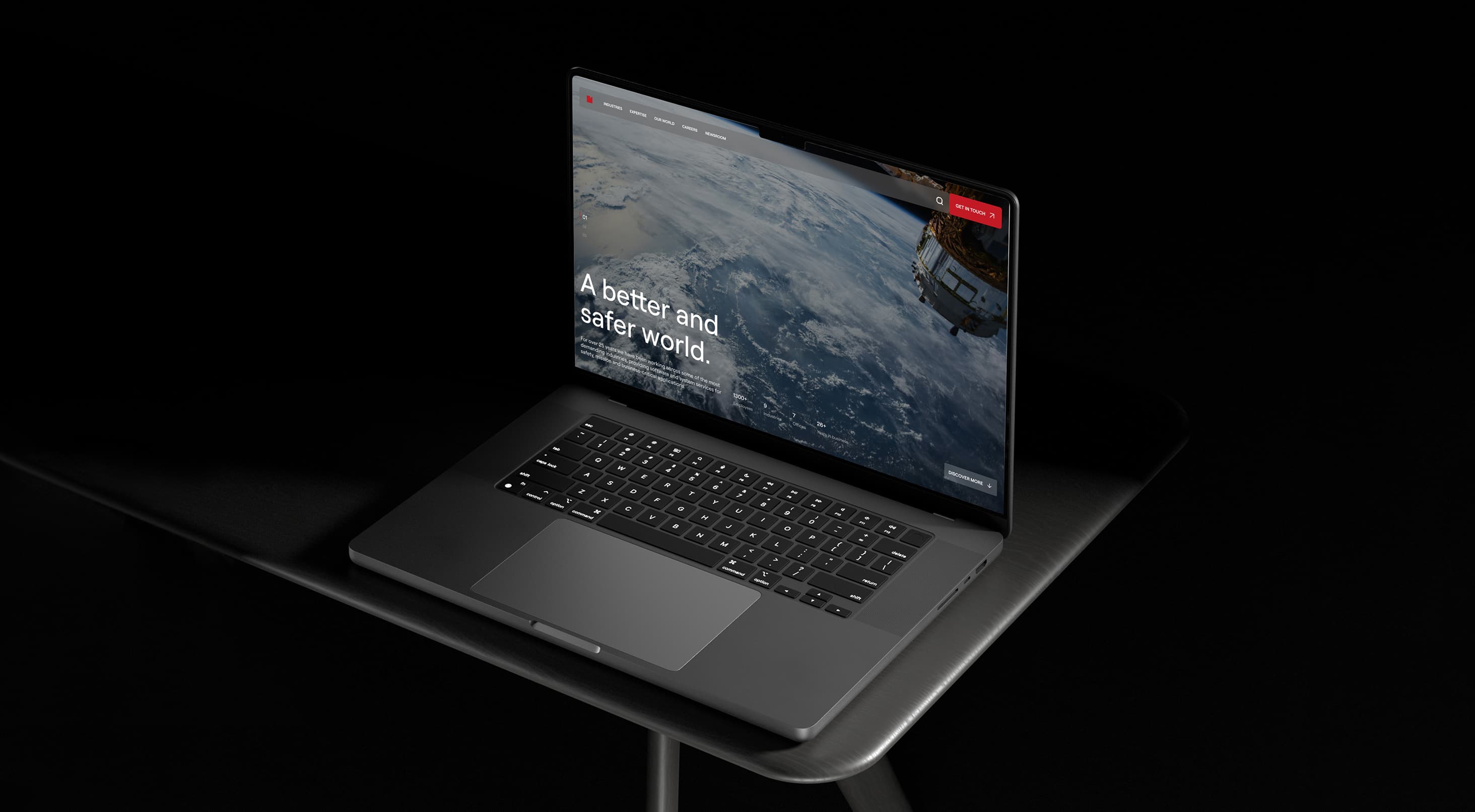 The new Critical Software homepage on a laptop, with an image of Earth seen from orbit